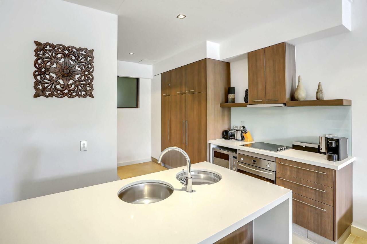 Elysium Private Apartments Triton By The Sea Palm Cove Exteriör bild